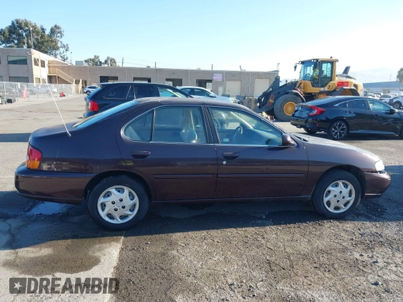 1999 Nissan Altima XE with VIN 1N4DL01D3XC209869, listed as a IAAI auction lot 41414580 with 175,076 mi miles. Bid and sale history available at carsss.com. Image 13.