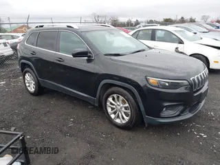 2019 Jeep Cherokee Latitude with VIN 1C4PJLCBXKD357403, listed as a IAAI auction lot 41606497 with 104,102 mi miles and . Bid and sale history available at carsss.com. Image 1.