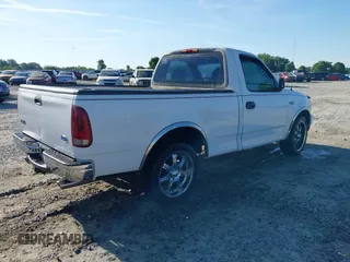 1997 Ford F-150 z VIN 1FTDF1764VNC68673, wystawiony jako IAAI lot #42306694 z przebiegiem 152 595 mil mil oraz . Historia ofert i sprzedaży dostępna na DreamBid. Obrazek 4.