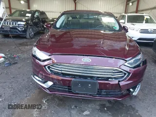 2017 Ford Fusion SE z VIN 3FA6P0HD2HR122650, wystawiony jako IAAI lot #41965411 z przebiegiem 107 227 mil mil oraz . Historia ofert i sprzedaży dostępna na DreamBid. Obrazek 6.