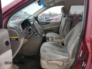 2009 Kia Sedona LX with VIN KNDMB233396271268, listed as a Copart auction lot 45562985 with 263,296 mi miles and Salvage Title. Bid and sale history available at carsss.com. Image 7.