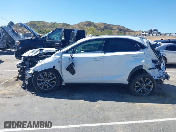 2019 Lexus NX 300 z VIN JTJYARBZ4K2129962, wystawiony jako IAAI lot #41818145 z przebiegiem Nie podano mil oraz . Historia ofert i sprzedaży dostępna na DreamBid. Obrazek 13.