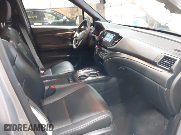 2021 Honda Passport EX-L with VIN 5FNYF8H56MB000107, listed as a IAAI auction lot 41868429 with 66,572 mi miles and . Bid and sale history available at DreamBid. Image 5.