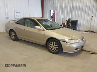 2001 Honda Accord EX z VIN 1HGCG225X1A015003, wystawiony jako IAAI lot #41866796 z przebiegiem 196 000 mil mil oraz . Historia ofert i sprzedaży dostępna na DreamBid. Obrazek 1.