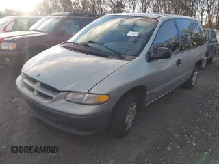 2000 Dodge Caravan with VIN 2B4FP25B3YR679708, listed as a IAAI auction lot 41596674 with Not Provided miles and . Bid and sale history available at DreamBid. Image 2.
