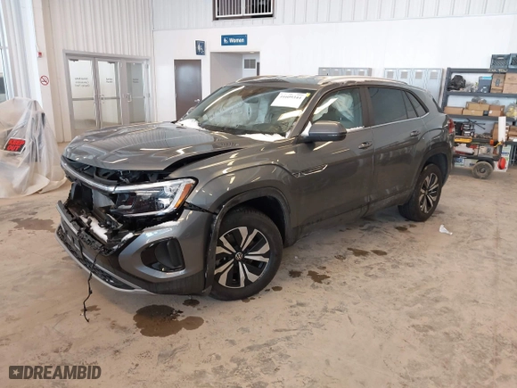 2024 Volkswagen Atlas Cross Sport 2.0T SE with VIN 1V2LE2CA2RC223746, listed as a IAAI auction lot 41609344 with 14,633 mi miles. Bid and sale history available at carsss.com. Image 18.