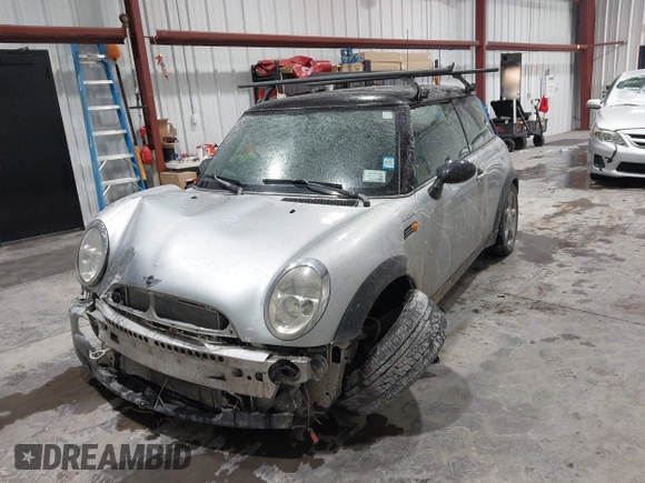 2002 MINI Hardtop with VIN WMWRC33422TC37296, listed as a IAAI auction lot 41385046 with 107,663 mi miles and . Bid and sale history available at DreamBid. Image 18.