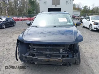 2019 Volkswagen Tiguan SE with VIN 3VV2B7AX7KM174382, listed as a IAAI auction lot 42147584 with 64,460 mi miles and . Bid and sale history available at DreamBid. Image 12.