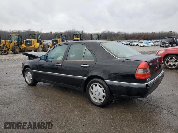 1996 Mercedes-Benz C with VIN WDBHA28E7TF328169, listed as a Copart auction lot 83653124 with 282,232 mi miles and Salvage Title. Bid and sale history available at carsss.com. Image 2.