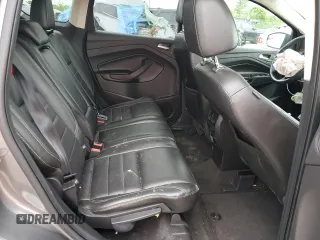 2013 Ford Escape SE с VIN 1FMCU9GX4DUA96010, выставлен на аукционе Copart как лот 57591945 с пробегом 162 760 миль миль и Списание • Salvage title. История ставок и продаж доступна на DreamBid. Изображение 11.