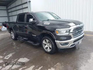 2022 Ram 1500 Laramie with VIN 1C6SRFJT7NN186647, listed as a IAAI auction lot 42471851 with 77,280 mi miles and . Bid and sale history available at DreamBid. Image 1.