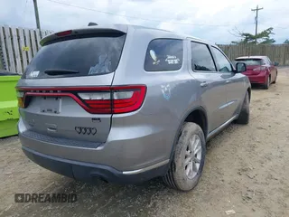2015 Dodge Durango SXT with VIN 1C4RDJAG9FC917085, listed as a IAAI auction lot 42385710 with 132,532 mi miles and . Bid and sale history available at DreamBid. Image 4.