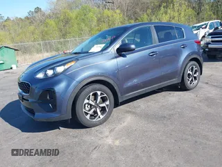 2020 Kia Sportage LX with VIN KNDPM3AC6L7720640, listed as a IAAI auction lot 41843861 with 114,977 mi miles. Bid and sale history available at carsss.com. Image 2.