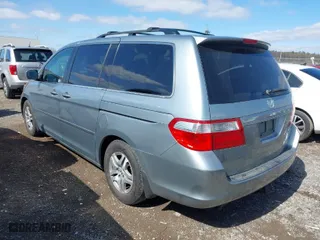 2005 Honda Odyssey EX-L with VIN 5FNRL38765B094377, listed as a IAAI auction lot 41933616 with 213,979 mi miles. Bid and sale history available at carsss.com. Image 3.