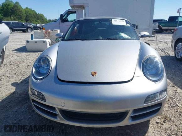 2006 Porsche 911 Carrera S z VIN WP0CB29976S766616, wystawiony jako IAAI lot #42119525 z przebiegiem 57 164 mil mil oraz . Historia ofert i sprzedaży dostępna na DreamBid. Obrazek 12.