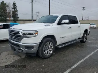 2020 Ram 1500 with VIN 1C6RREKG4LN401571, listed as a Copart auction lot 43620245 with 99,979 mi miles and Salvage title. Bid and sale history available at DreamBid. Image 1.
