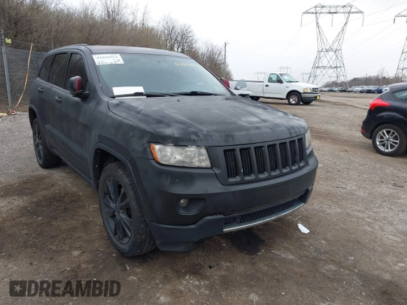 2013 Jeep Grand Cherokee Laredo with VIN 1C4RJEAG2DC573970, listed as a IAAI auction lot 41892914 with 185,050 mi miles. Bid and sale history available at carsss.com. Image 6.
