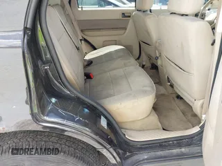 2011 Ford Escape XLT with VIN 1FMCU9D77BKA45274, listed as a IAAI auction lot 42073521 with 245,073 mi miles. Bid and sale history available at carsss.com. Image 8.