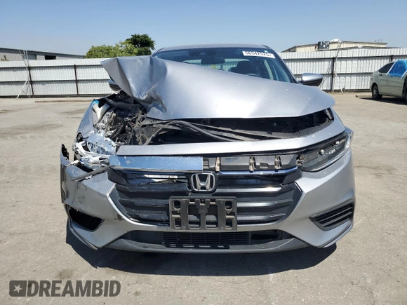 2019 Honda Insight LX z VIN 19XZE4F15KE021890, wystawiony jako Copart lot #56342525 z przebiegiem Nie podano mil oraz Szkoda całkowita • Salvage title. Historia ofert i sprzedaży dostępna na DreamBid. Obrazek 5.