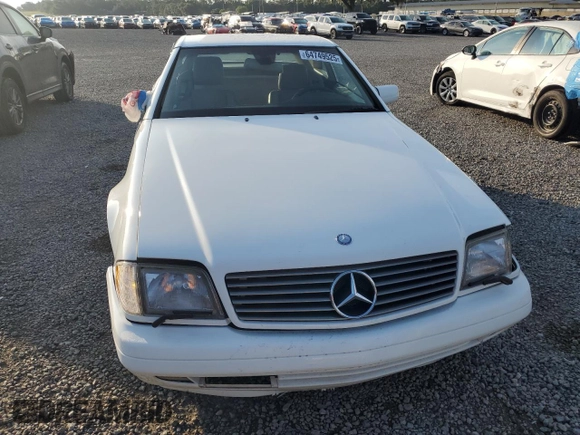 1997 Mercedes-Benz SL 500 with VIN WDBFA67FXVF149930, listed as a Copart auction lot 64749525 with 88,523 mi miles and Salvage title. Bid and sale history available at DreamBid. Image 5.