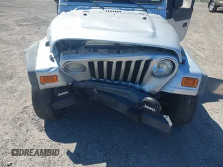 2006 Jeep Wrangler X with VIN 1J4FA39S86P743660, listed as a IAAI auction lot 41890339 with 198,099 mi miles and . Bid and sale history available at DreamBid. Image 6.