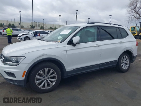2019 Volkswagen Tiguan S with VIN 3VV1B7AX2KM039970, listed as a IAAI auction lot 41498706 with 56,907 mi miles and . Bid and sale history available at DreamBid. Image 6.