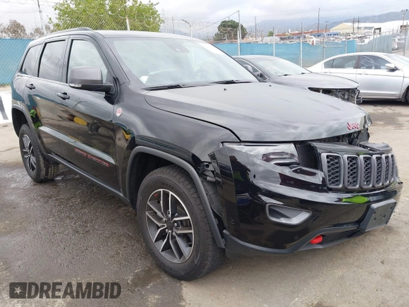 2021 Jeep Grand Cherokee Trailhawk with VIN 1C4RJFLT4MC771773, listed as a IAAI auction lot 42063954 with 17,920 mi miles and . Bid and sale history available at DreamBid. Image 1.