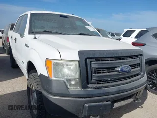 2014 Ford F-150 XL with VIN 1FTFW1ET4EKG52553, listed as a IAAI auction lot 42545917 with 113,497 mi miles and . Bid and sale history available at DreamBid. Image 1.
