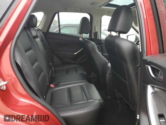 2016 Mazda CX-5 Grand Touring with VIN JM3KE4DY5G0660201, listed as a Copart auction lot 52165205 with 108,231 mi miles and Salvage Title. Bid and sale history available at DreamBid. Image 11.
