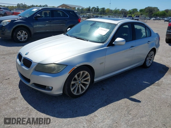 2011 BMW 3 Series 328i with VIN WBAPH7G57BNM57845, listed as a IAAI auction lot 41803365 with 243,952 mi miles. Bid and sale history available at carsss.com. Image 2.