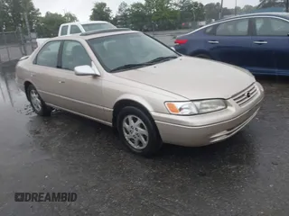 1998 Toyota Camry LE z VIN JT2BF22K0W0126460, wystawiony jako IAAI lot #42325495 z przebiegiem 193 034 mil mil oraz . Historia ofert i sprzedaży dostępna na DreamBid. Obrazek 1.