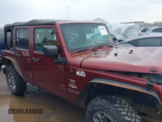 2007 Jeep Wrangler Unlimited Sahara with VIN 1J4GA59177L162022, listed as a IAAI auction lot 41887599 with 207,358 mi miles and . Bid and sale history available at DreamBid. Image 12.