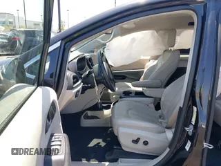 2021 Chrysler Pacifica Hybrid Touring L with VIN 2C4RC1L71MR599631, listed as a IAAI auction lot 42151965 with 67,401 mi miles and . Bid and sale history available at DreamBid. Image 5.