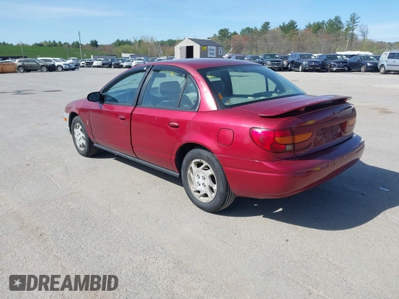 2000 Saturn SL z VIN 1G8ZK5274YZ241392, wystawiony jako IAAI lot #42168456 z przebiegiem 99 406 mil mil oraz . Historia ofert i sprzedaży dostępna na DreamBid. Obrazek 3.