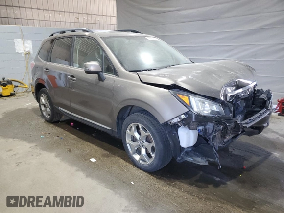 2017 Subaru Forester Touring с VIN JF2SJAWC0HH485803, выставлен на аукционе Copart как лот 55204015 с пробегом 107 337 миль миль и Списание • Salvage title. История ставок и продаж доступна на DreamBid. Изображение 4.