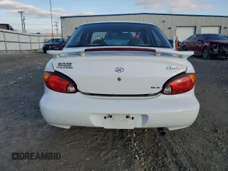 2000 Hyundai Elantra GLS z VIN KMHJF35F4YU038977, wystawiony jako Copart lot #80800144 z przebiegiem 97 373 mil mil oraz Czysty tytuł • Clean title. Historia ofert i sprzedaży dostępna na DreamBid. Obrazek 6.
