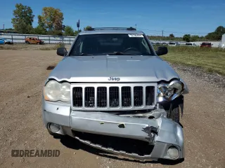 2009 Jeep Grand Cherokee Laredo with VIN 1J8HR48P29C537653, listed as a Copart auction lot 70190404 with 192,796 mi miles and Salvage Title. Bid and sale history available at carsss.com. Image 5.