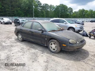 1999 Ford Taurus SE z VIN 1FAFP53S7XA203980, wystawiony jako IAAI lot #42454765 z przebiegiem Nie podano mil oraz . Historia ofert i sprzedaży dostępna na DreamBid. Obrazek 1.
