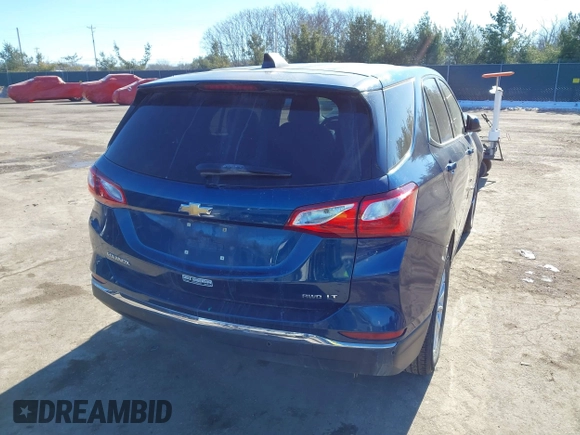 2020 Chevrolet Equinox LT with VIN 2GNAXUEV6L6185542, listed as a IAAI auction lot 41409792 with 56,533 mi miles and . Bid and sale history available at DreamBid. Image 4.