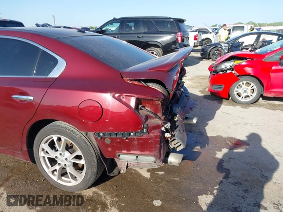 2013 Nissan Maxima S with VIN 1N4AA5AP5DC847780, listed as a IAAI auction lot 42018318 with 128,839 mi miles and . Bid and sale history available at DreamBid. Image 6.