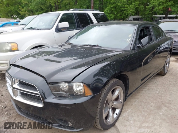 2011 Dodge Charger SE with VIN 2B3CL3CG3BH512706, listed as a IAAI auction lot 42122199 with 181,258 mi miles and . Bid and sale history available at carsss.com. Image 2.