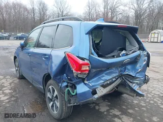 2018 Subaru Forester Limited with VIN JF2SJAJC4JH525104, listed as a IAAI auction lot 42018479 with 97,843 mi miles. Bid and sale history available at carsss.com. Image 3.