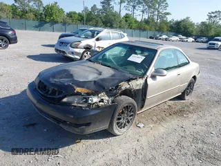 1999 Acura CL Premium z VIN 19UYA2255XL014474, wystawiony jako IAAI lot #42124075 z przebiegiem 212 404 mil mil oraz . Historia ofert i sprzedaży dostępna na DreamBid. Obrazek 2.