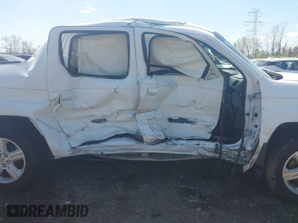 2009 Honda Ridgeline RTL with VIN 5FPYK16529B107871, listed as a IAAI auction lot 42049833 with 141,214 mi miles. Bid and sale history available at carsss.com. Image 6.