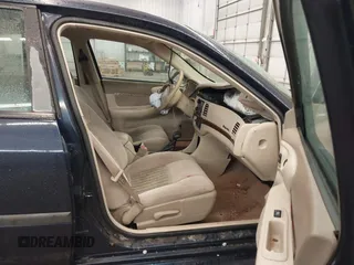 2002 Chevrolet Impala LS z VIN 2G1WH55K529142095, wystawiony jako IAAI lot #42145543 z przebiegiem 214 718 mil mil oraz . Historia ofert i sprzedaży dostępna na DreamBid. Obrazek 5.