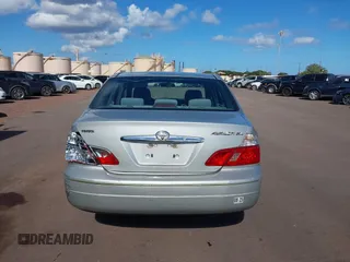 2003 Toyota Avalon XL z VIN 4T1BF28B93U274928, wystawiony jako IAAI lot #42034461 z przebiegiem 150 549 mil mil oraz . Historia ofert i sprzedaży dostępna na DreamBid. Obrazek 17.