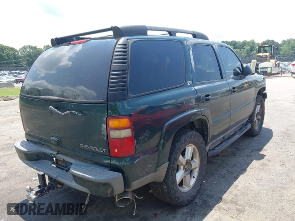2003 Chevrolet Tahoe Z71 with VIN 1GNEK13Z33R245611, listed as a IAAI auction lot 42481140 with 260,757 mi miles and . Bid and sale history available at DreamBid. Image 4.