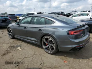 2019 Audi RS 5 Sportback z VIN WUABWCF50KA907035, wystawiony jako Copart lot #65824283 z przebiegiem 32 063 mil mil oraz . Historia ofert i sprzedaży dostępna na DreamBid. Obrazek 2.