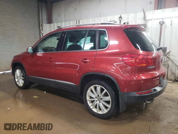 2013 Volkswagen Tiguan SE z VIN WVGBV3AX8DW092397, wystawiony jako Copart lot #51956225 z przebiegiem 138 901 mil mil oraz Szkoda całkowita • Salvage title. Historia ofert i sprzedaży dostępna na DreamBid. Obrazek 2.