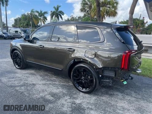 2022 Kia Telluride SX z VIN 5XYP5DHC0NG283894, wystawiony jako Copart lot #57398195 z przebiegiem 8 098 mil mil oraz Szkoda całkowita • Salvage title. Historia ofert i sprzedaży dostępna na DreamBid. Obrazek 3.